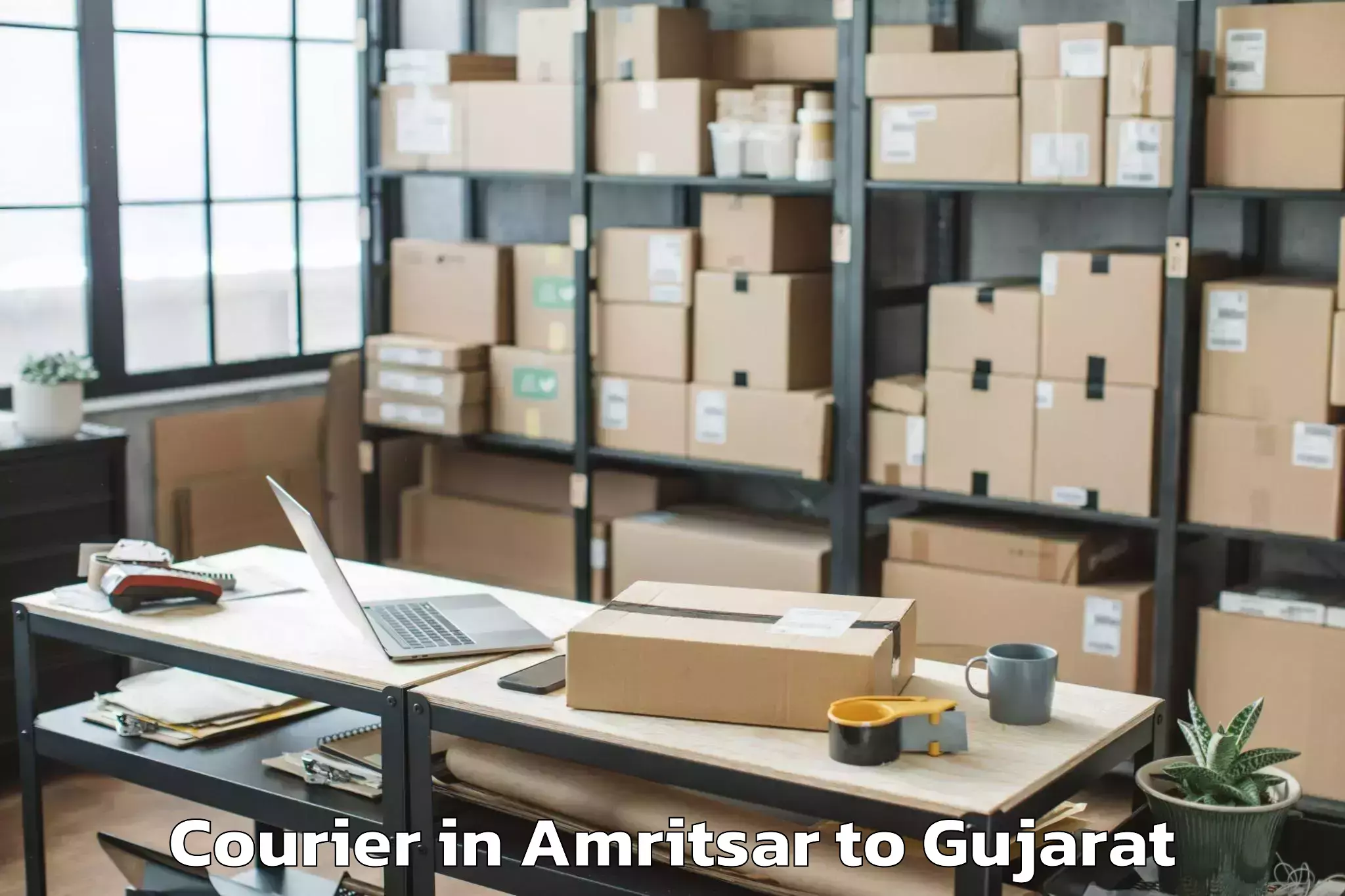 Trusted Amritsar to Vaghodia Courier